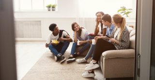 Best Conversation Starters - over 80 questions to start a conversation - teens sitting and talking